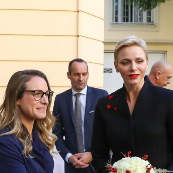 Exclusif - Le prince Albert II de Monaco et la princesse Charlene participent à la remise des cadeaux aux anciens monégasques dans les locaux de la Croix Rouge à Monaco le 16 décembre 2016.