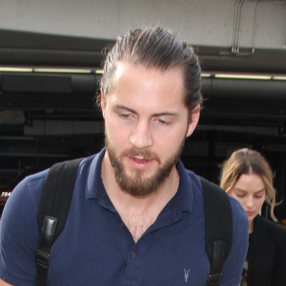 Margot Robbie et Tom Ackerley au LAX le 15 novembre 2016.