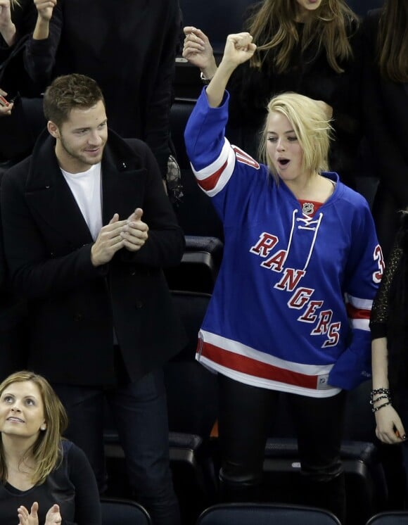 Margot Robbie et Tom Ackerley au Madison Square Garden à New York le 26 février 2015.