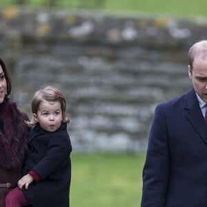 Le prince William, la duchesse Catherine et leurs enfants le prince George et la princesse Charlotte de Cambridge ont passé Noël avec les Middleton, se rendant le 25 décembre 2016 à la messe en l'église St Mark d'Englefield, dans le Berkshire.