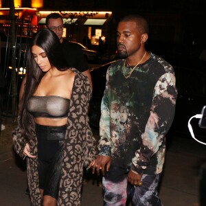 Kim Kardashian et son mari Kanye West arrivent au défilé Off White collection printemps été 2017 à Paris le 29 septembre 2016