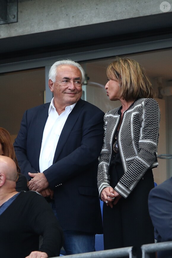 Dominique Strauss Kahn et sa compagne Myriam L'Aouffir assistent à la finale de la Coupe de France entre le Psg et Auxerre au Stade de France à Saint-Denis le 30 mai 2015
