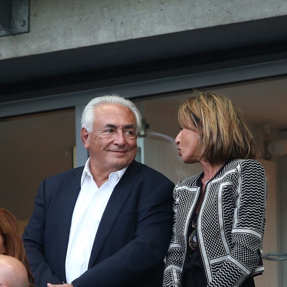 Dominique Strauss Kahn et sa compagne Myriam L'Aouffir assistent à la finale de la Coupe de France entre le Psg et Auxerre au Stade de France à Saint-Denis le 30 mai 2015