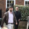 George Michael quitte son domicile avec son petit-ami Fadi Fawaz à Londres le 14 mars 2012.