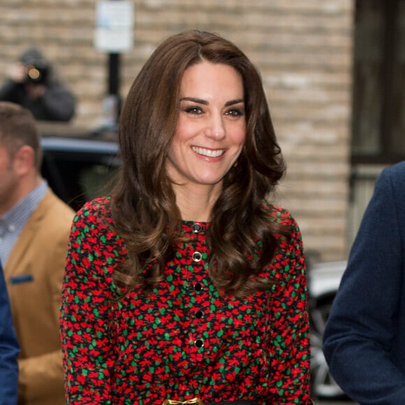 La duchesse Catherine de Cambridge, le prince William et le prince Harry prenaient part le 19 décembre 2016 à l'assemblée générale et la fête de Noël de leur association Heads Together, à Londres.