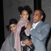 Beyoncé, Jay Z et leur fille Blue Ivy Carter sortant de l'avant-première d'Annie à New York en décembre 2014