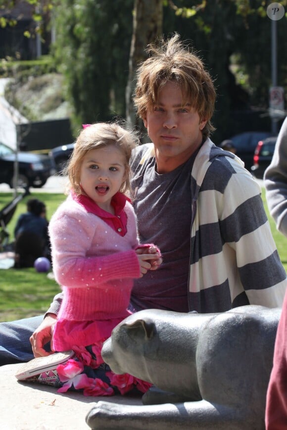 Proud papa Larry Birkhead takes his daughter Dannielynn to a local park for a day of fun. Dannielynn, who looks more like her mother Anna Nicole Smith every day, rode a scooter with her dad's help and the two took a walk together, stopping so she could admire a statue of a mountain lion. It was recently reported that Anna Nicole Smith's life is to be the subject of a grand opera produced by the Royal Opera to be performed at Covent Garden starting in 2012 in Beverly Hills, Los Angeles, CA, USA on March 13, 2010. Photo by GSI/ABACAPRESS.COM14/03/2010 - 