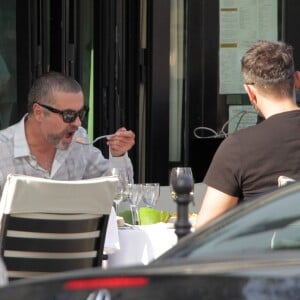 George Michael et Fadi Fawaz déjeunent à Paris, le 23 mars 2013