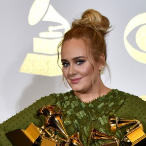 Singer Adele appears backstage with her awards for Album Of The Year and Best Pop Vocal Album for "25"and Song Of The Year, Record Of The Year and Best Pop Solo Performance for "Hello" during the 59th annual Grammy Awards held at Staples Center in Los Angeles, CA, USA, on February 12, 2017. Photo by Christine Chew/UPI/ABACAPRESS.COM13/02/2017 - Los Angeles