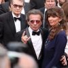 Philippe Manoeuvre et sa femme Candice de la Richardière (bijoux Van Cleef & Arpels) - Montée des marches du film "Mad Max : Fury Road" lors du 68e Festival International du Film de Cannes, à Cannes le 14 mai 2015.