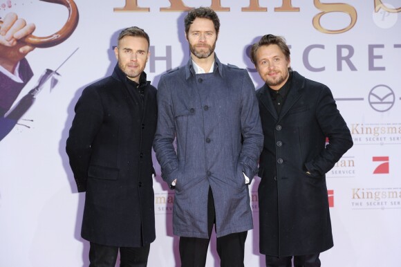 Gary Barlow, Howard Donald et Mark Owen du groupe "Take That" à la Première du film "Kingsman : Services secrets" à Berlin. Le 3 février 2015