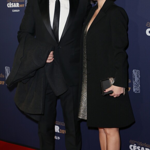 Jean Dujardin et sa compagne Nathalie Péchalat sur le tapis rouge de la 42ème cérémonie des César à la Salle Pleyel à Paris le 24 février 2017. © Olivier Borde / Dominique Jacovides / Bestimage
