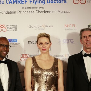 Githinji Gitahi, la princesse Charlene de Monaco et Gilles Tonelli - Photocall de la soirée de gala de L'AMREF Flying Doctors à Monaco le 24 février 2017.