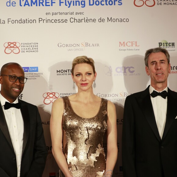 Githinji Gitahi, la princesse Charlene de Monaco et Gilles Tonelli - Photocall de la soirée de gala de L'AMREF Flying Doctors à Monaco le 24 février 2017.