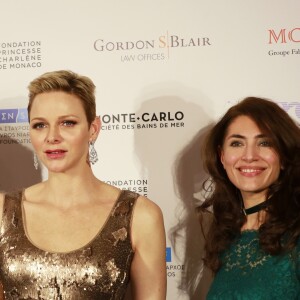 La princesse Charlene de Monaco et Caterina Murino - Photocall de la soirée de gala de L'AMREF Flying Doctors à Monaco le 24 février 2017.
