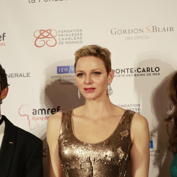 Pierre Frolla , la princesse Charlene de Monaco et Caterina Murino - Photocall de la soirée de gala de L'AMREF Flying Doctors à Monaco le 24 février 2017.