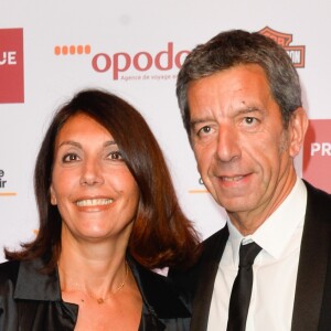 Michel Cymes avec sa femme lors du dîner de gala du 96ème Prix d'Amérique Opodo à l'hôtel Salomon de Rothschild à Paris, le 28 janvier 2017. © Guirec Coadic/Bestimage