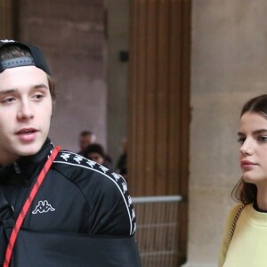Victoria Beckham, son fils Brooklyn et Sonia Ben Ammar arrivent au Musée du Louvre à Paris. Le 11 mars 2017.
