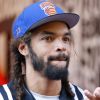 Le basketteur Joakim Noah assiste à l'inauguration d'une nouvelle boutique "Foot Locker" à New York le 30 août 2016.