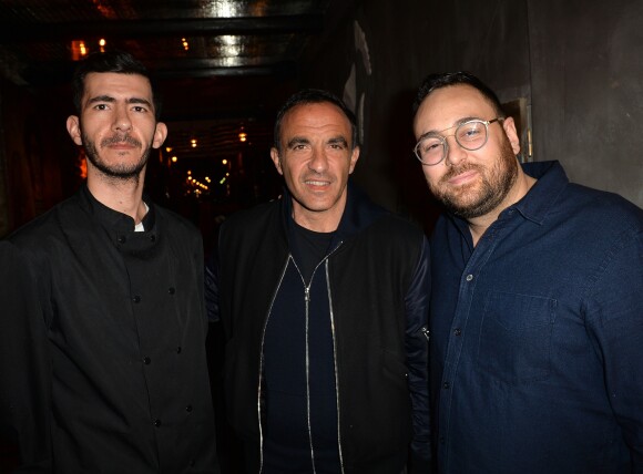 Manolis Giorgakis (le chef), Nikos Aliagas et Audren Dimitris - Soirée d'ouverture du restaurant "Ikone" à Paris le 30 mars 2017.