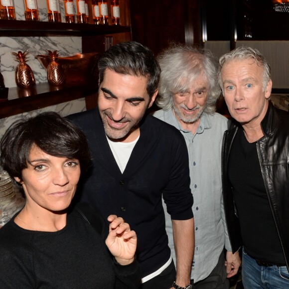 Exclusif - Florence Foresti, Ary Abittan, Louis Bertignac et Franck Dubosc lors de la soirée d'inauguration (cocktail dînatoire) du nouveau restaurant, méditerranéen, de la salle Pleyel, le Noto, à Paris, France, le 29 mars 2017. Benjamin Patou et Cyril Colbeau-Justin ont su s'entourer des meilleurs pour Noto. L'architecte L. Gonzalez et l'instigateur du projet B. Patou ont entrecroisé leurs inspirations et leurs imaginaires pour créer Noto. Au piano, le chef P. Charvet. © Rachid Bellak/Bestimage