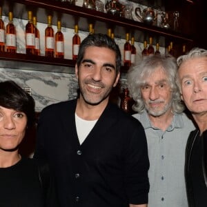 Exclusif - Florence Foresti, Ary Abittan, Louis Bertignac et Franck Dubosc lors de la soirée d'inauguration (cocktail dînatoire) du nouveau restaurant, méditerranéen, de la salle Pleyel, le Noto, à Paris, France, le 29 mars 2017. Benjamin Patou et Cyril Colbeau-Justin ont su s'entourer des meilleurs pour Noto. L'architecte L. Gonzalez et l'instigateur du projet B. Patou ont entrecroisé leurs inspirations et leurs imaginaires pour créer Noto. Au piano, le chef P. Charvet. © Rachid Bellak/Bestimage