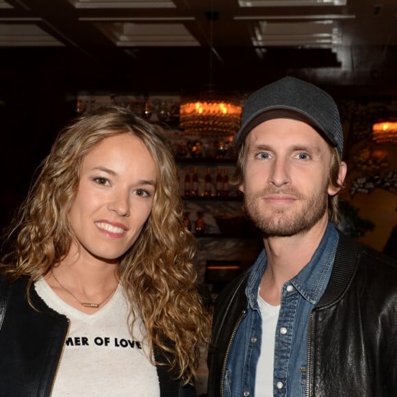 Exclusif - Philippe Lacheau et sa compagne Elodie Fontan lors de la soirée d'inauguration (cocktail dînatoire) du nouveau restaurant, méditerranéen, de la salle Pleyel, le Noto, à Paris, France, le 29 mars 2017. Benjamin Patou et Cyril Colbeau-Justin ont su s'entourer des meilleurs pour Noto. L'architecte L. Gonzalez et l'instigateur du projet B. Patou ont entrecroisé leurs inspirations et leurs imaginaires pour créer Noto. Au piano, le chef P. Charvet. © Rachid Bellak/Bestimage