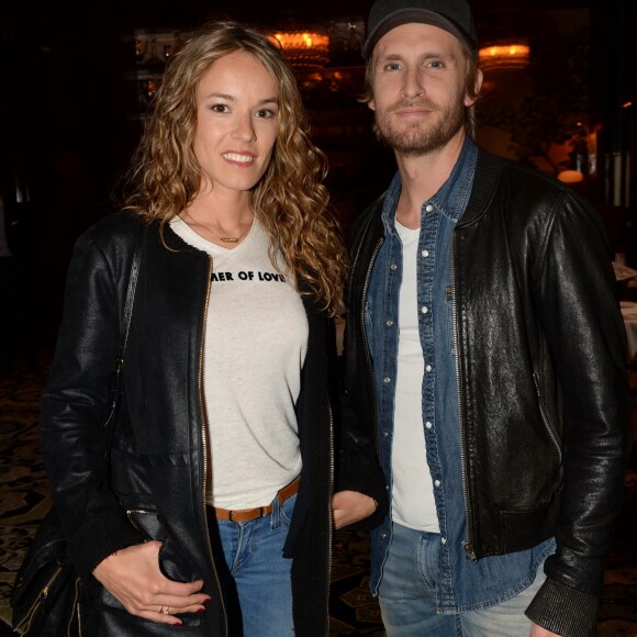 Exclusif - Philippe Lacheau et sa compagne Elodie Fontan lors de la soirée d'inauguration (cocktail dînatoire) du nouveau restaurant, méditerranéen, de la salle Pleyel, le Noto, à Paris, France, le 29 mars 2017. Benjamin Patou et Cyril Colbeau-Justin ont su s'entourer des meilleurs pour Noto. L'architecte L. Gonzalez et l'instigateur du projet B. Patou ont entrecroisé leurs inspirations et leurs imaginaires pour créer Noto. Au piano, le chef P. Charvet. © Rachid Bellak/Bestimage