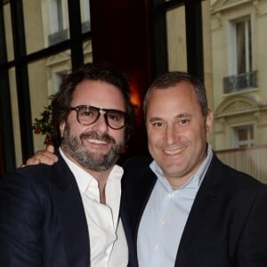 Exclusif - Cyril Colbeau-Justin et Benjamin Patou (PDG de Moma Group) lors de la soirée d'inauguration (cocktail dînatoire) du nouveau restaurant, méditerranéen, de la salle Pleyel, le Noto, à Paris, France, le 29 mars 2017. Benjamin Patou et Cyril Colbeau-Justin ont su s'entourer des meilleurs pour Noto. L'architecte L. Gonzalez et l'instigateur du projet B. Patou ont entrecroisé leurs inspirations et leurs imaginaires pour créer Noto. Au piano, le chef P. Charvet. © Rachid Bellak/Bestimage