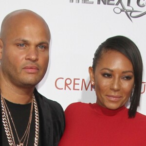 Melanie Brown (Mel B) et son mari Stephen Belafonte à la première de ‘BarberShop' au théâtre TCL Chinese à Hollywood, le 6 avril 2016