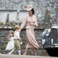 Catherine (Kate) Middleton, duchesse de Cambridge et ses enfants, la princesse Charlotte de Cambridge et le prince George de Cambridge qui sont les enfants d'honneur du mariage de Pippa Middleton et James Matthews, en l'église St Mark à Englefield, Berkshire, Royaume Uni, le 20 mai 2017.