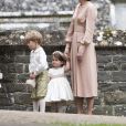 Catherine (Kate) Middleton, duchesse de Cambridge et ses enfants, la princesse Charlotte de Cambridge et le prince George de Cambridge qui sont les enfants d'honneur du mariage de Pippa Middleton et James Matthews, en l'église St Mark à Englefield, Berkshire, Royaume Uni, le 20 mai 2017.