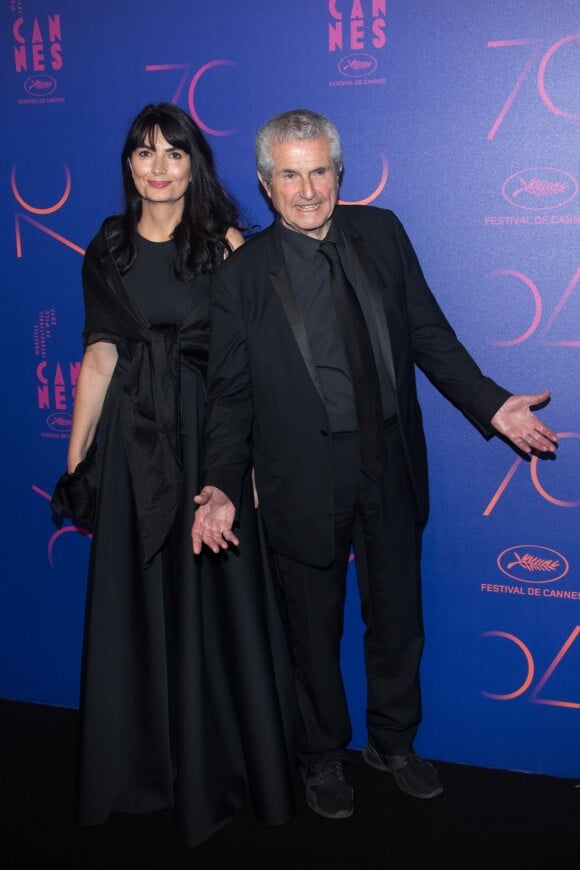 Claude Lelouch et sa compagne Valérie Perrin - Photocall du dîner des 70 ans du Festival International du Film de Cannes. Le 23 mai 2017. © Borde-Jacovides-Moreau / Bestimage