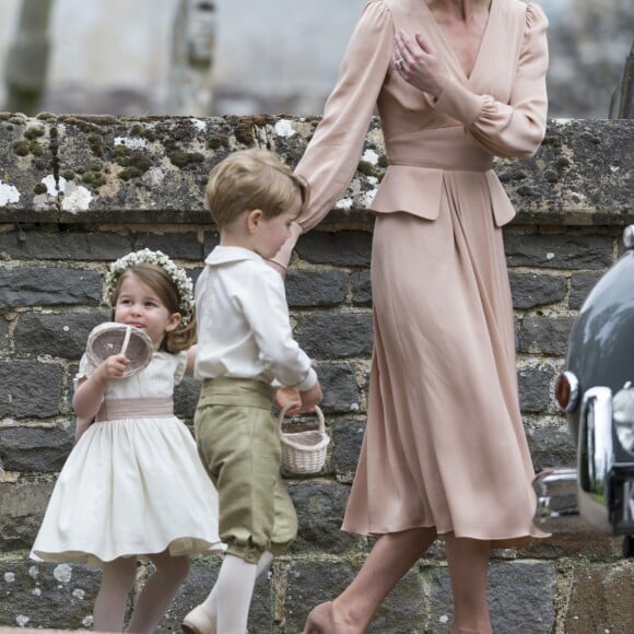 Kate Middleton, duchesse de Cambridge, et sa fille la princesse Charlotte de Cambridge - Mariage de Pippa Middleton et James Matthew, en l'église St Mark Englefield, Berkshire, Royaume Uni, le 20 mai 2017.