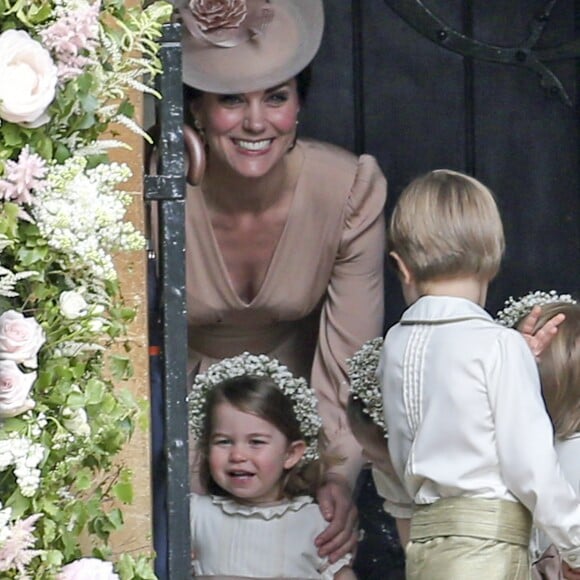 Kate Middleton, duchesse de Cambridge, et sa fille la princesse Charlotte de Cambridge - Mariage de Pippa Middleton et James Matthew, en l'église St Mark Englefield, Berkshire, Royaume Uni, le 20 mai 2017.