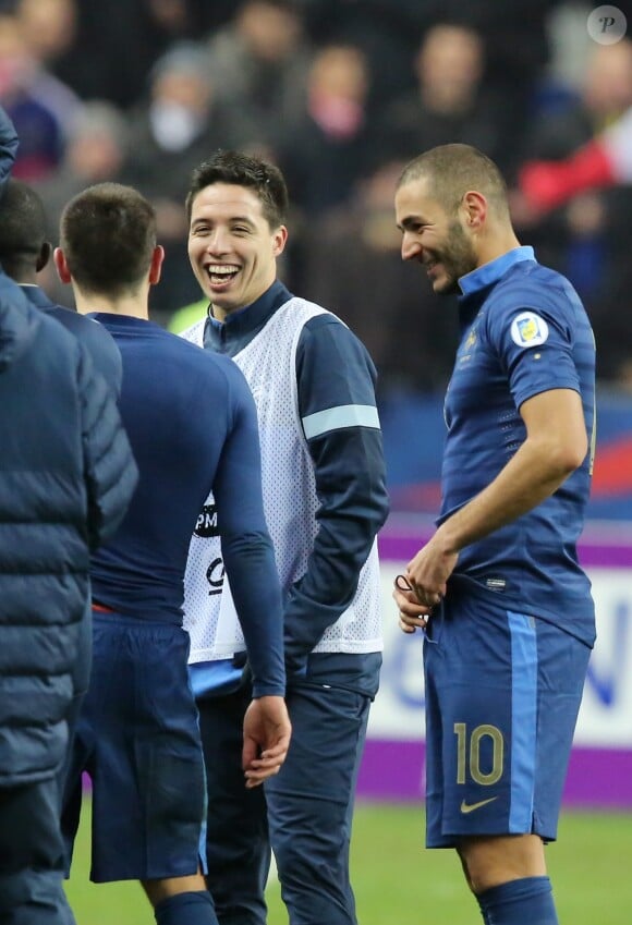 Frank Ribery, Samir Nasri et Karim Benzema - L'equipe de France de football fête sa victoire et sa qualification pour le Mondial au Bresil en 2014 au stade de France, à Saint-Denis le 19 novembre 2013.
