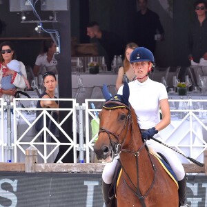 Matilde Borromeo monte sous ls yeux de la princesse Caroline de Hanovre, qui porte son petit-fils Stefano Casiraghi, d'Alexandra de Hanovre et de Beatrice Borromeo, mère de Stefano lors du Jumping international de Monte-Carlo, étape du Longines Global Champions Tour, le 23 juin 2017 à Monaco. © Bruno Bebert / Bestimage