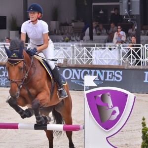 Matilde Borromeo monte sous le regard, en tribunes, de la princesse Caroline de Hanovre, qui porte son petit-fils Stefano Casiraghi, d'Alexandra de Hanovre et de Beatrice Borromeo, mère de Stefano lors du Jumping international de Monte-Carlo, étape du Longines Global Champions Tour, le 23 juin 2017 à Monaco. © Bruno Bebert / Bestimage