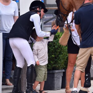 Charlotte Casiraghi avec son fils Raphaël lors de sa participation au Jumping international de Monte-Carlo, étape du Longines Global Champions Tour, le 23 juin 2017 à Monaco. © Bruno Bebert / Bestimage