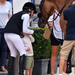 Charlotte Casiraghi avec son fils Raphaël lors de sa participation au Jumping international de Monte-Carlo, étape du Longines Global Champions Tour, le 23 juin 2017 à Monaco. © Bruno Bebert / Bestimage