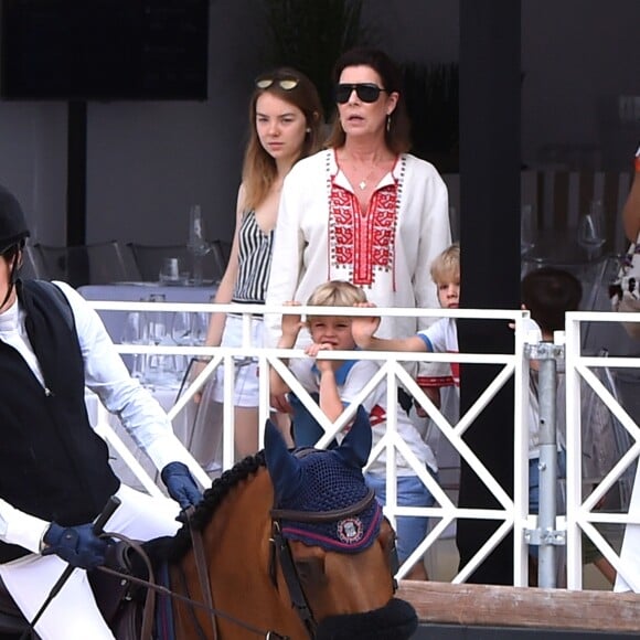 Charlotte Casiraghi passe devant sa mère la princesse Caroline de Hanovre et sa soeur la princesse Alexandra de Hanovre lors du Jumping international de Monte-Carlo, étape du Longines Global Champions Tour, le 23 juin 2017 à Monaco. © Bruno Bebert / Bestimage