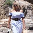 Pamela Anderson se promène avec son fils Dylan Jagger Lee et son chien Zoubisoubisou sur le port de Saint-Tropez le 29 juin 2017.