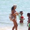 Ludivine Sagna avec son fils Elias sur la plage à Miami, le 18 juillet 2017.18/07/2017 - Miami