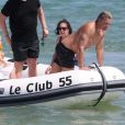 Natasha Poly, son mari Peter Bakker et leur fille Aleksandra au Club 55 à Saint-Tropez le 22 juillet 2017.