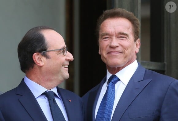 François Hollande et Arnold Schwarzenegger - Le président français reçoit en entretien M. Arnold Schwarzenegger, ancien gouverneur de l'Etat de Californie, fondateur et vice-président du réseau des régions pour le Climat "R 20", au palais de l'Elysée à Paris. Le 10 octobre 2014