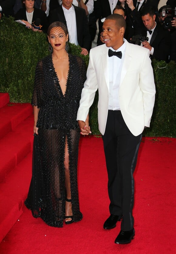 Jay-Z et sa femme Beyonce Knowles à la Soirée du Met Ball / Costume Institute Gala 2014: "Charles James: Beyond Fashion" à New York le 5 mai 2014.
