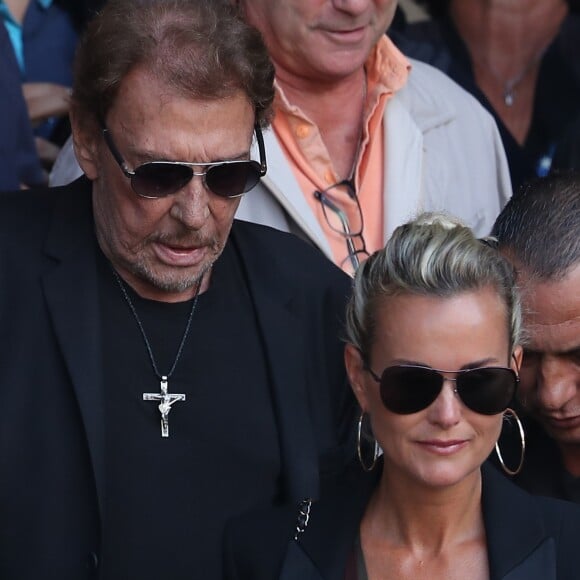 Johnny et Laeticia Hallyday - Sorties des obsèques de Mireille Darc en l'église Saint-Sulpice à Paris. Le 1er septembre 2017.