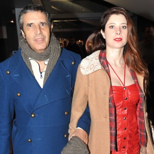 Julien Clerc et sa femme Helene Gremillon arrivent a la premiere de 'Arretez moi' a Paris le 6 Fevrier 2013.