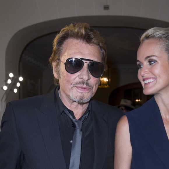 Johnny et Laeticia Hallyday - Inauguration du Show Room Parisien De Grisogono et lancement de la montre "Crazy Skull" à Paris le 23 octobre 2014.
