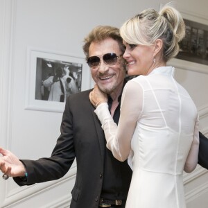 Johnny Hallyday et sa femme Laeticia Hallyday - People au défilé de mode Haute-Couture automne-hiver 2016/2017 "Christian Dior" à Paris. Le 4 juillet 2016 © Olivier Borde / Bestimage